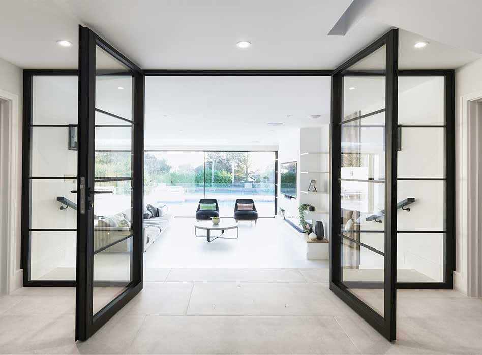 Custom Double Hinged Glass Door Installation in Dubai UAE