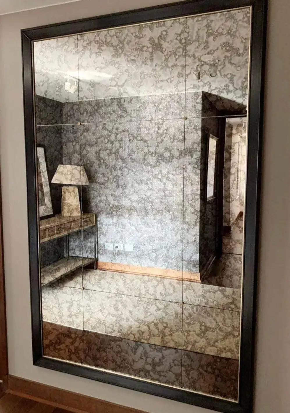 Black framed antique mirror installation Dubai Abu Dhabi | مرآة عتيقة بإطار أسود